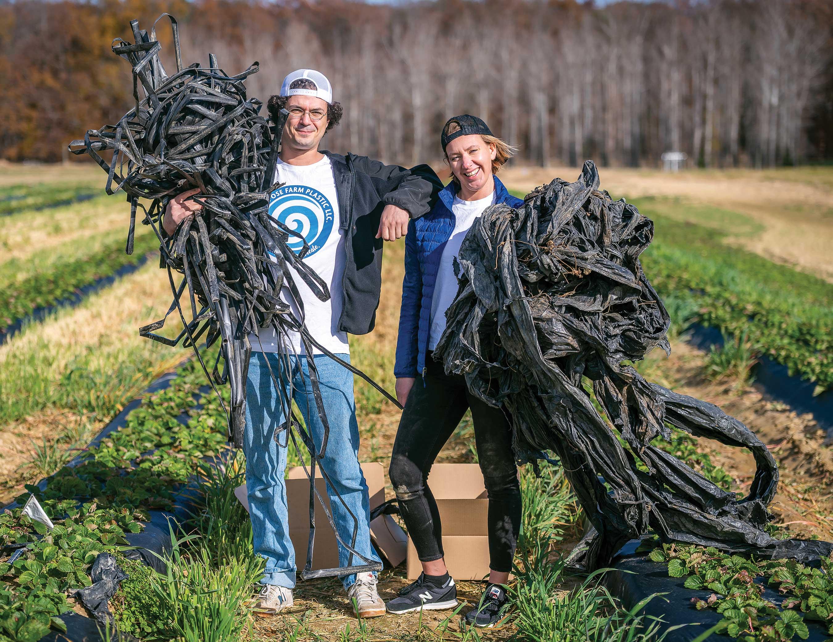 Benjamin Rickles, CTO, standing next to Repurpose Farm Plastic LLC’s CEO Krisztina Christmas while holding farm plastic. 