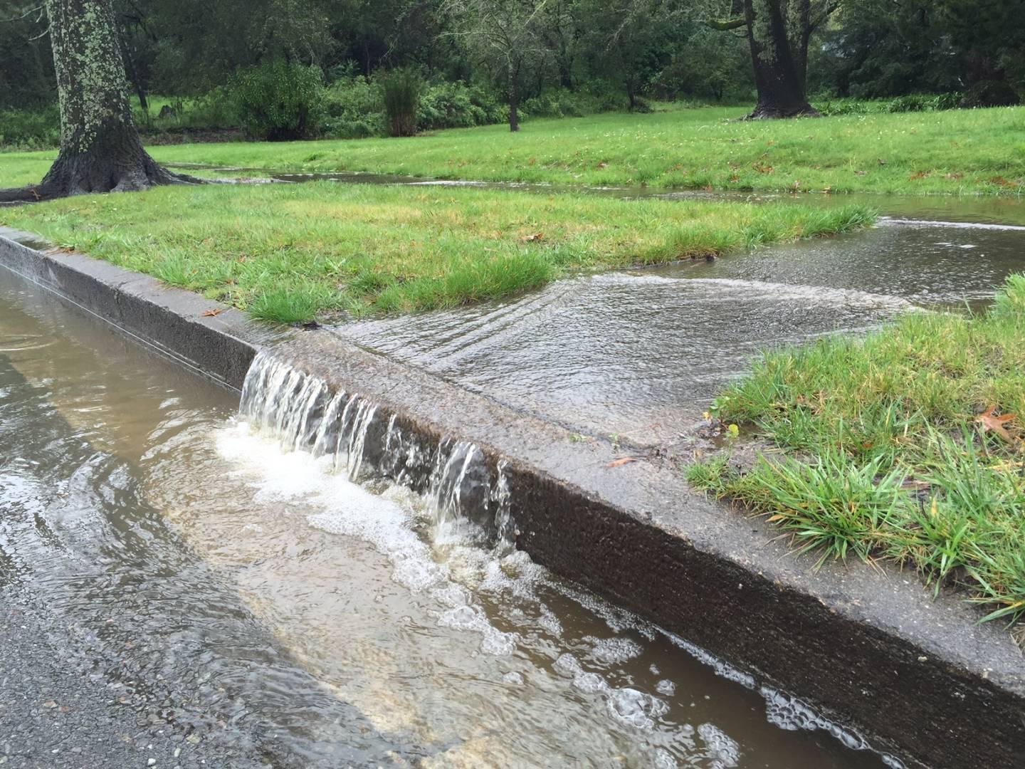 stormwater running off sidewalk